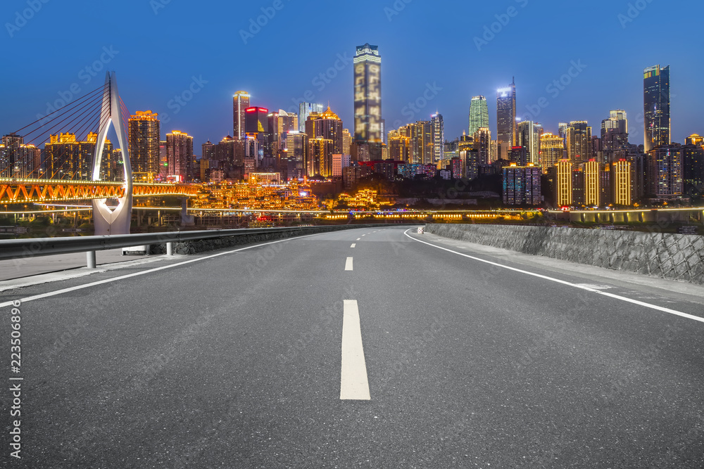 Road pavement and Chongqing urban architecture skyline