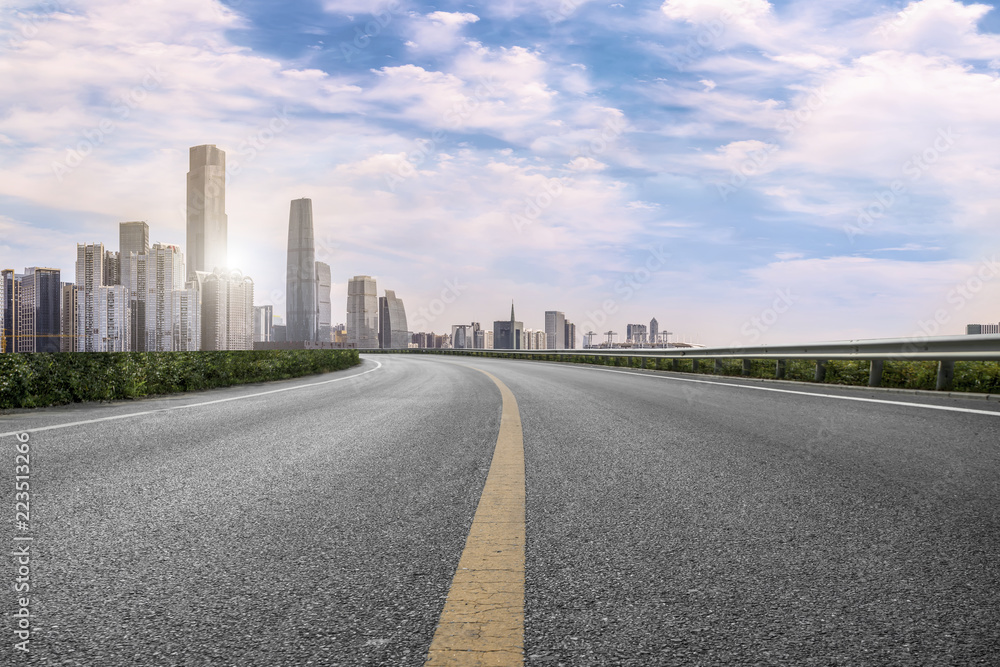 Road pavement and Guangzhou city buildings skyline