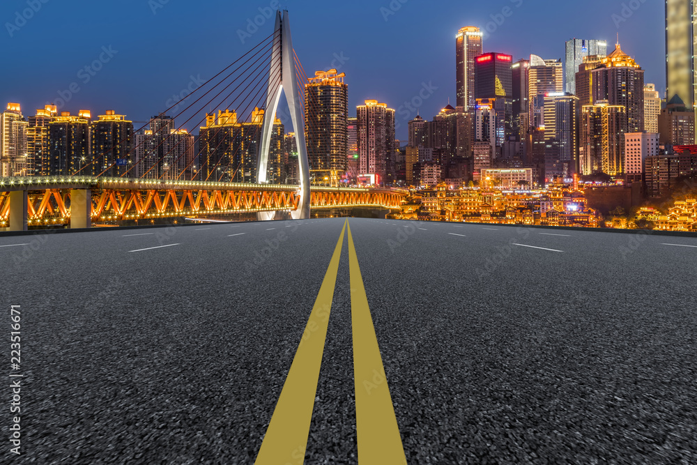 Road pavement and Chongqing urban architecture skyline