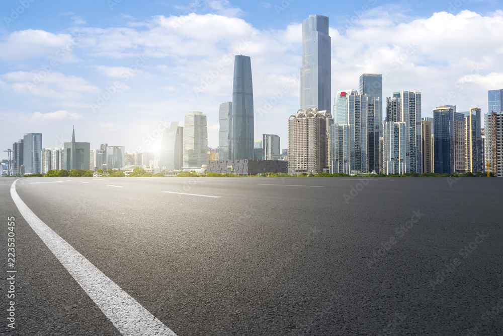 Road pavement and Guangzhou city buildings skyline