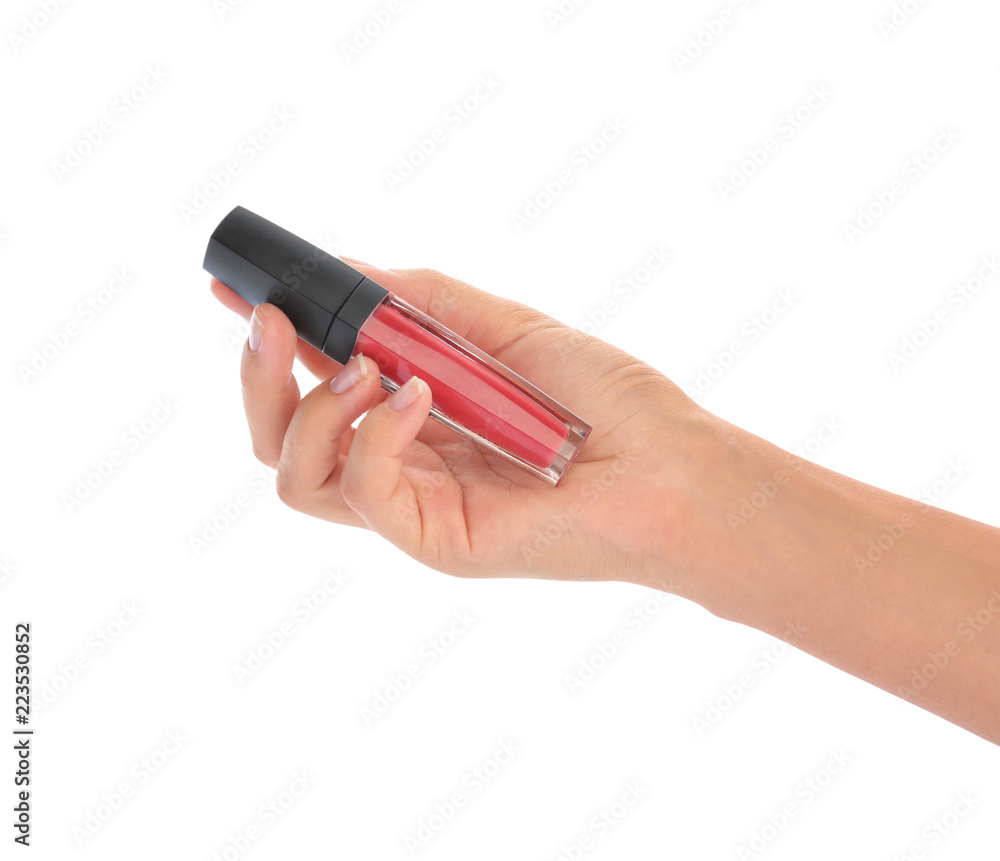 Female hand with liquid pink lipstick on white background