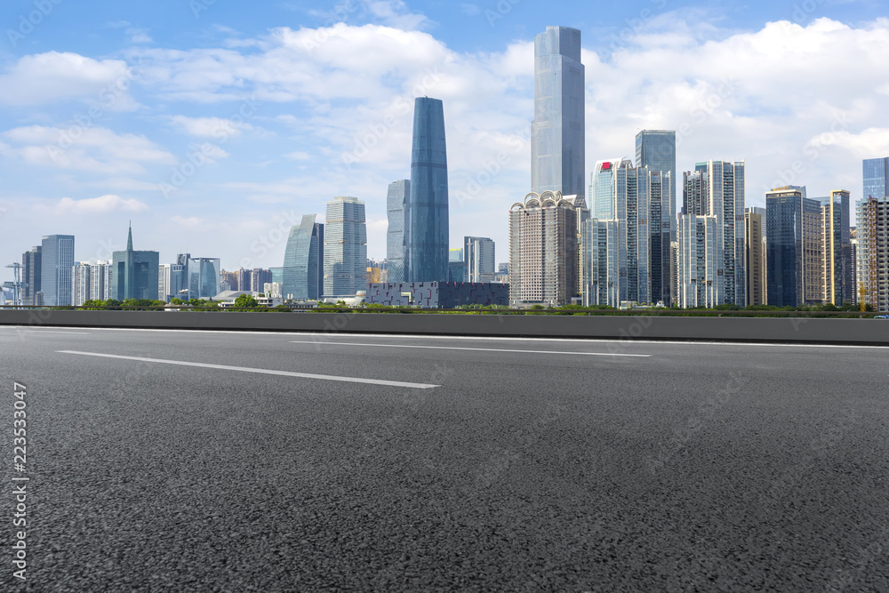 Road pavement and Guangzhou city buildings skyline