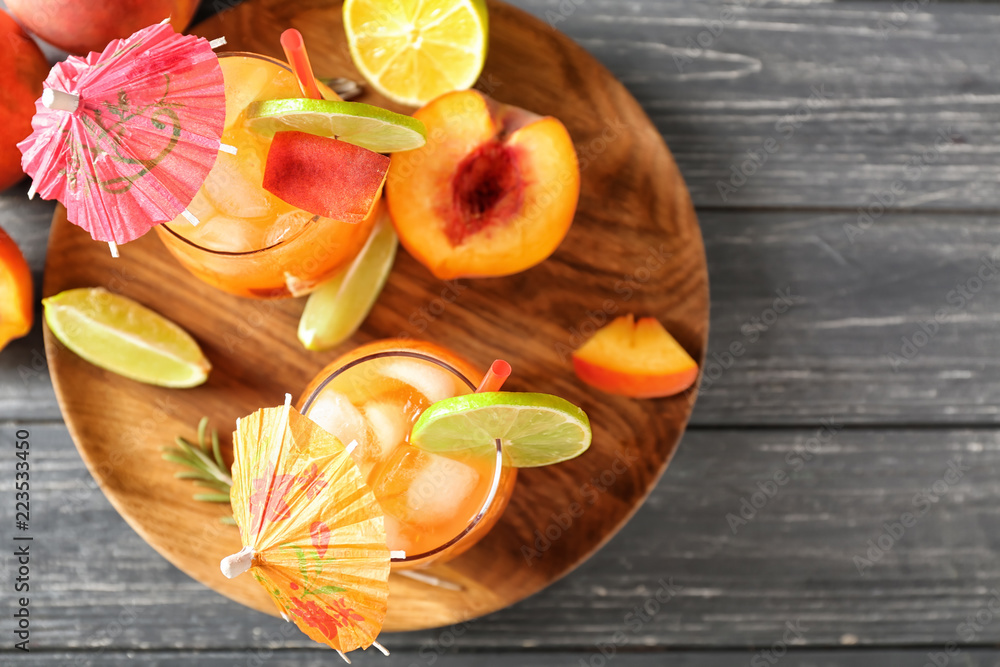 Fresh summer cocktail in glasses on wooden board