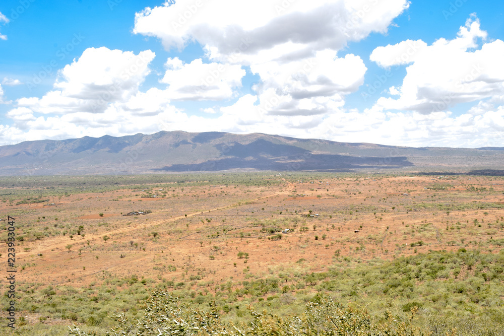 landscape with a mountain background and blue sky, Kajiado, Kenya