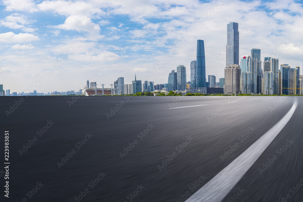 Road pavement and Guangzhou city buildings skyline