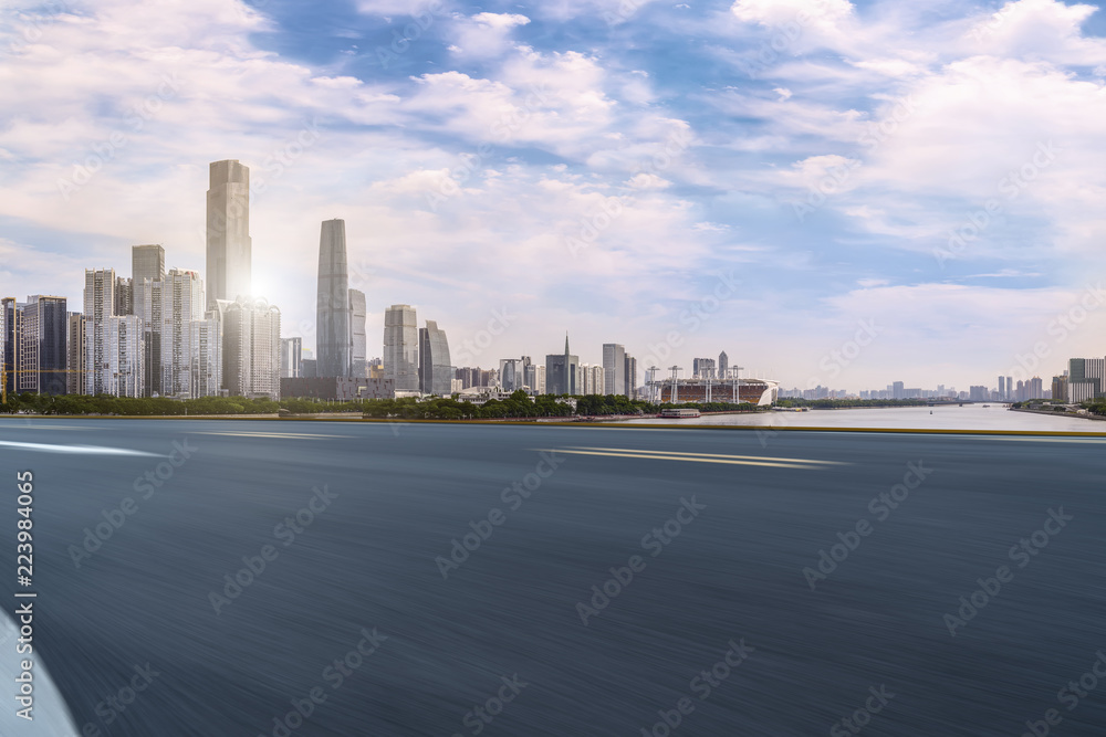 Road pavement and Guangzhou city buildings skyline