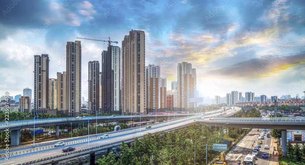 Road pavement and city building skyscrapers