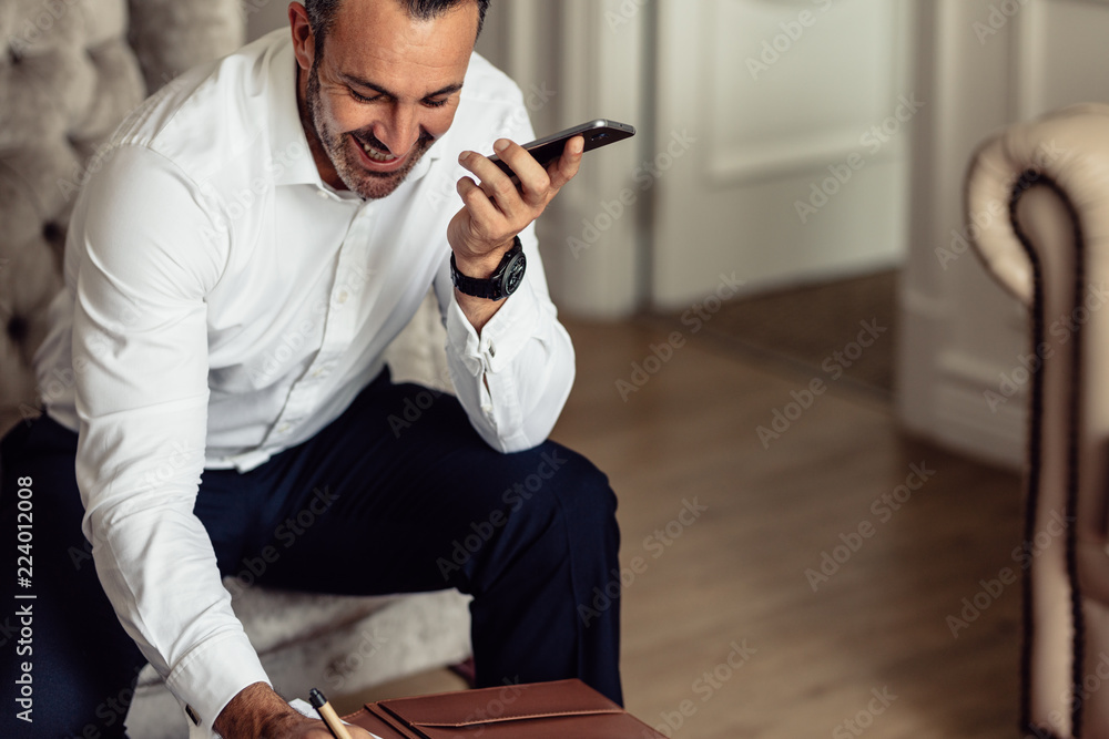 CEO on business trip working from hotel room