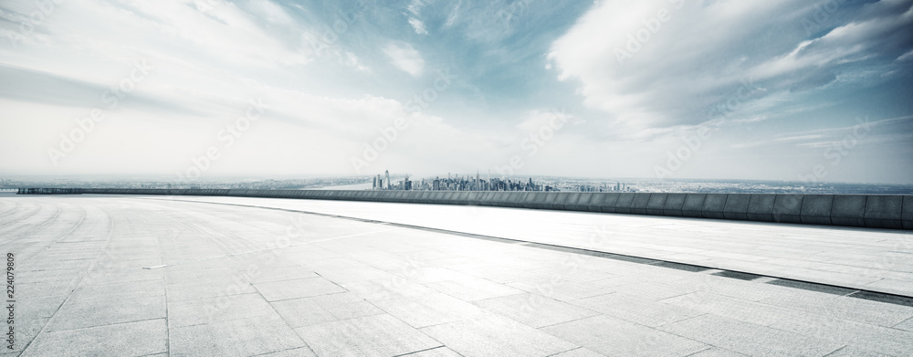 empty floor with modern cityscape in new york