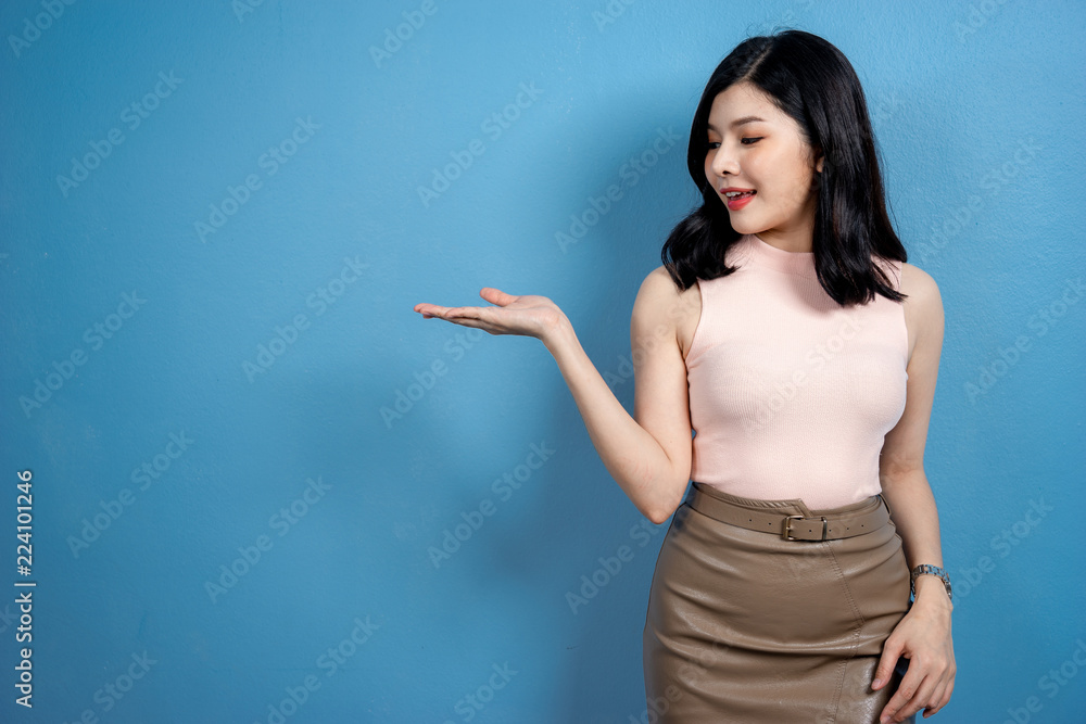 Shopping Woman concept, portrait or isolated an beautiful Asian woman wearing dress, hat and sunglas