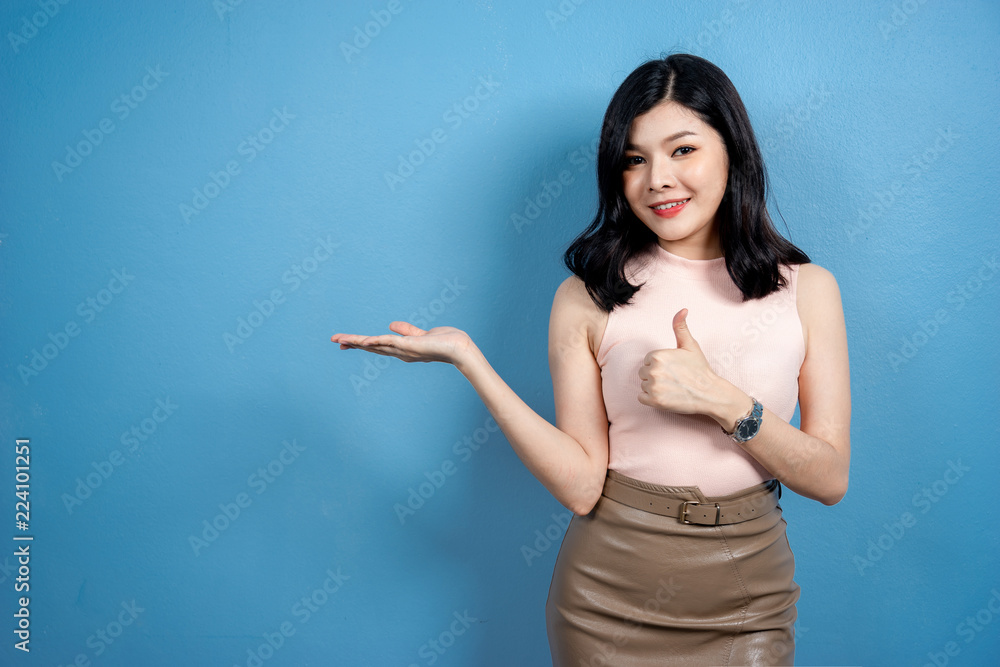 Shopping Woman concept, portrait or isolated an beautiful Asian woman wearing dress, hat and sunglas