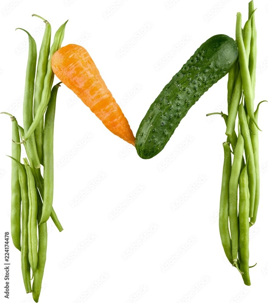 Close-up of vegetable alphabet isolated on white background