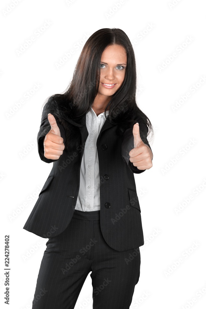 Beautiful young brunette businesswoman giving two thumbs up