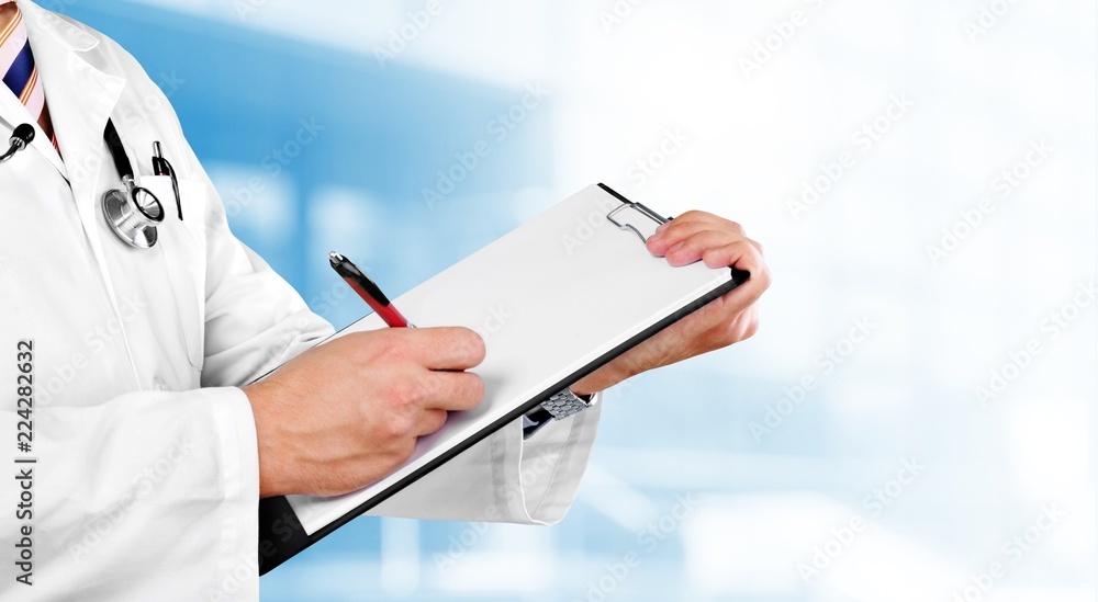 Close-up Doctor at hospital working with tablet