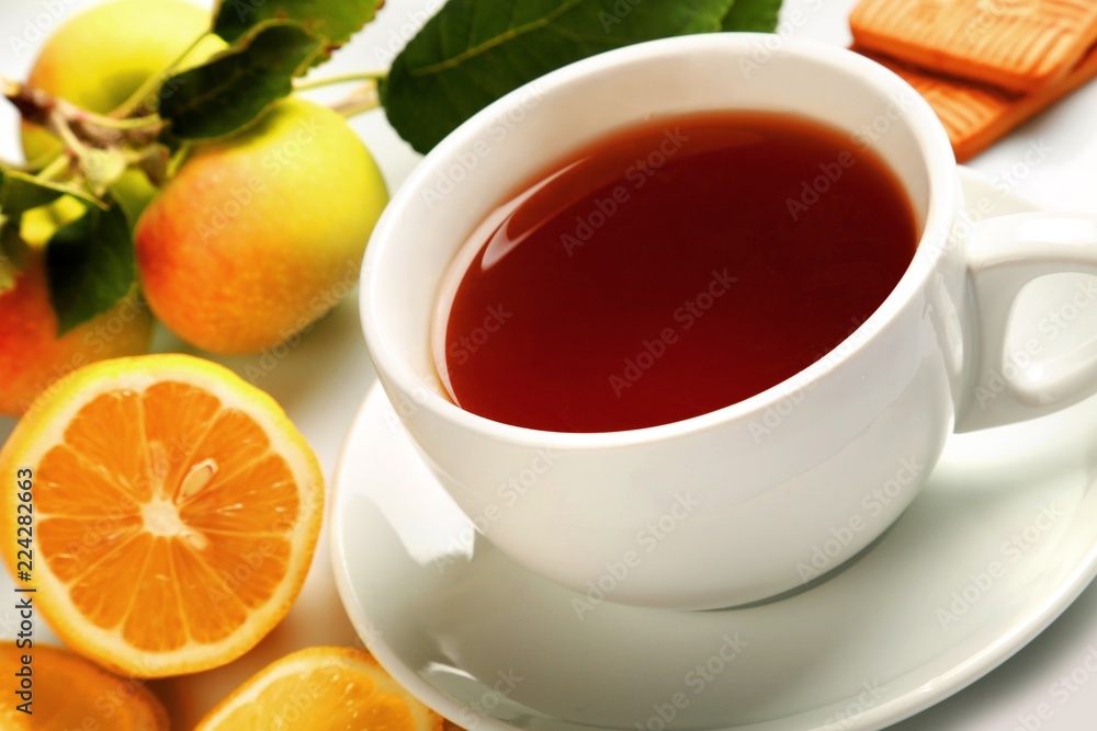 Hot drink with lemons and cookies