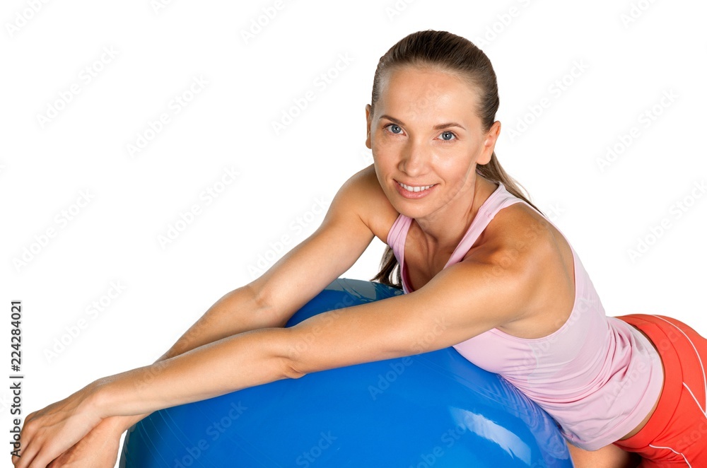 Young beautiful sporty woman  with fitness ball