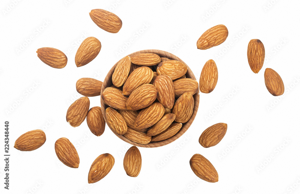 Almond nut in a wooden bowl isolated on a white background. Top view