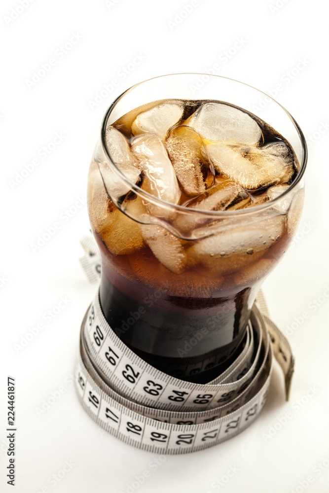 Cola With Ice Cubes In Glass Wrapper With Tape Measure