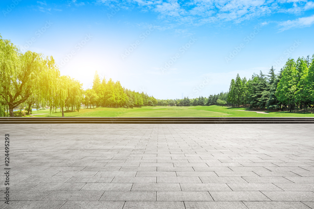 Empty city square floor and green woods scenery