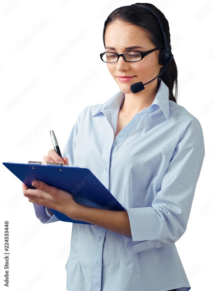 Close-up portrait of young businesswoman with headphones