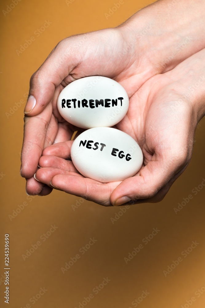 Cupped Hands Holding Two Eggs With the Inscription Retirement