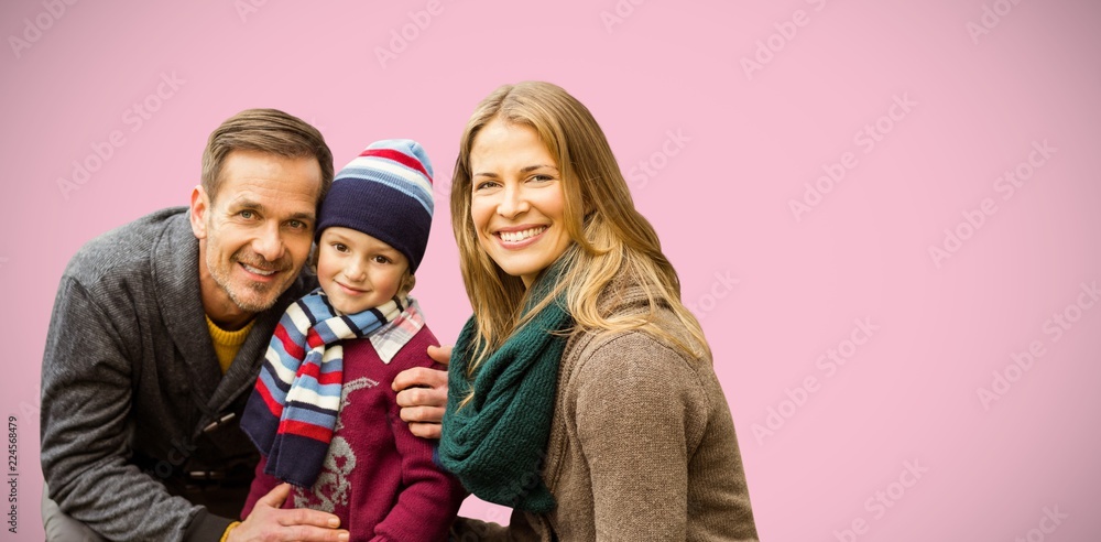 Composite image of  portrait of family smiling together