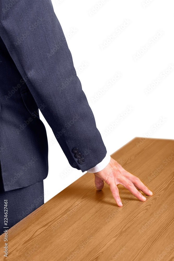 Close-up of business man hand in suit isolated on white