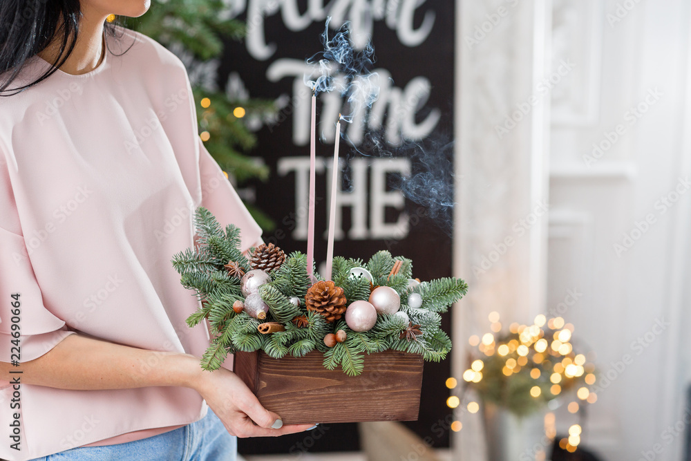 blow out the candles and smoke. Workshop of Christmas decor with their own hands. Christmas wooden b