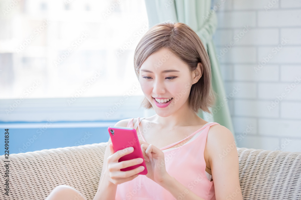 woman use phone happily