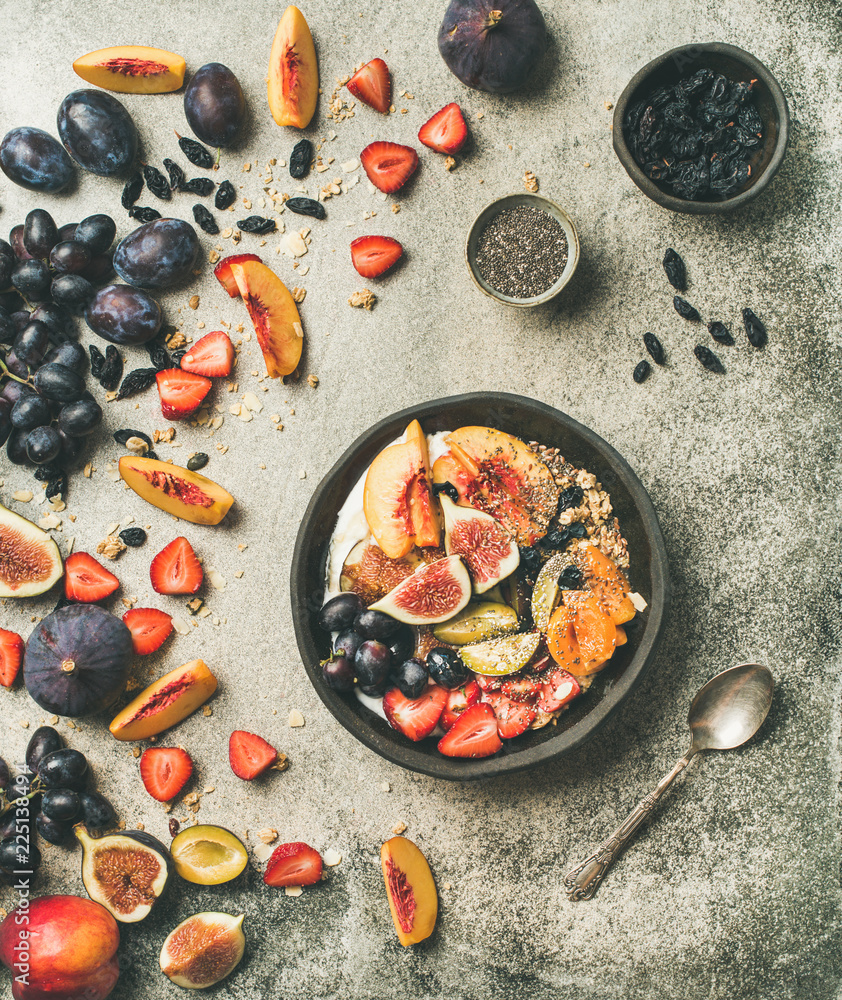 Healthy seasonal fall breakfast variety. Flat-lay of Greek yogurt, fresh fruit, chia seeds bowl over