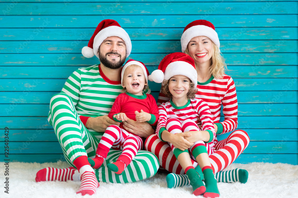 Happy family having fun at Christmas time