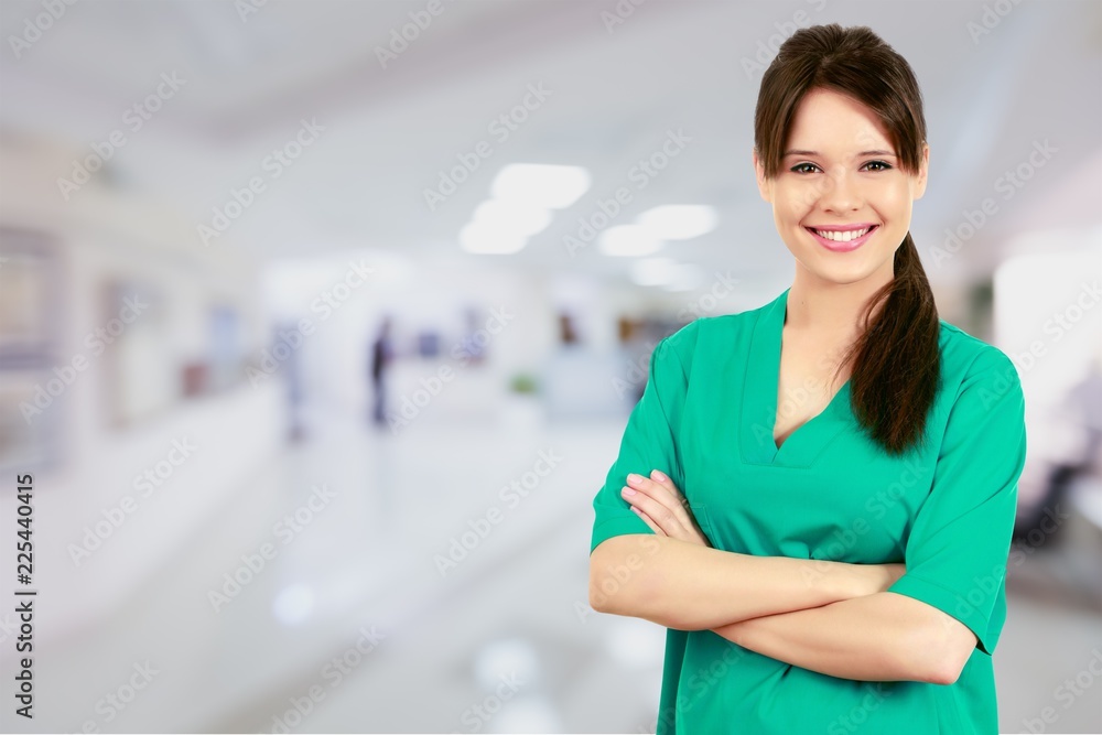 Young nurse woman with stethoscope at hospital