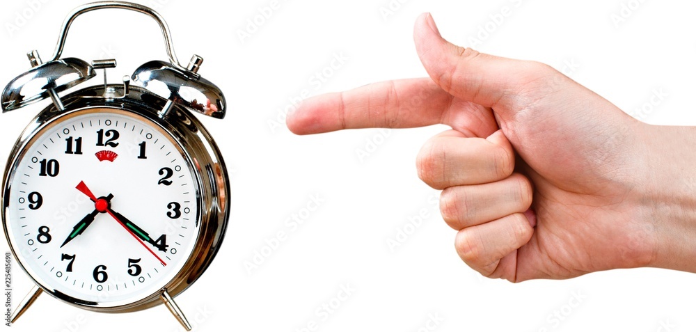 Man indicates on alarm clock isolated on white background