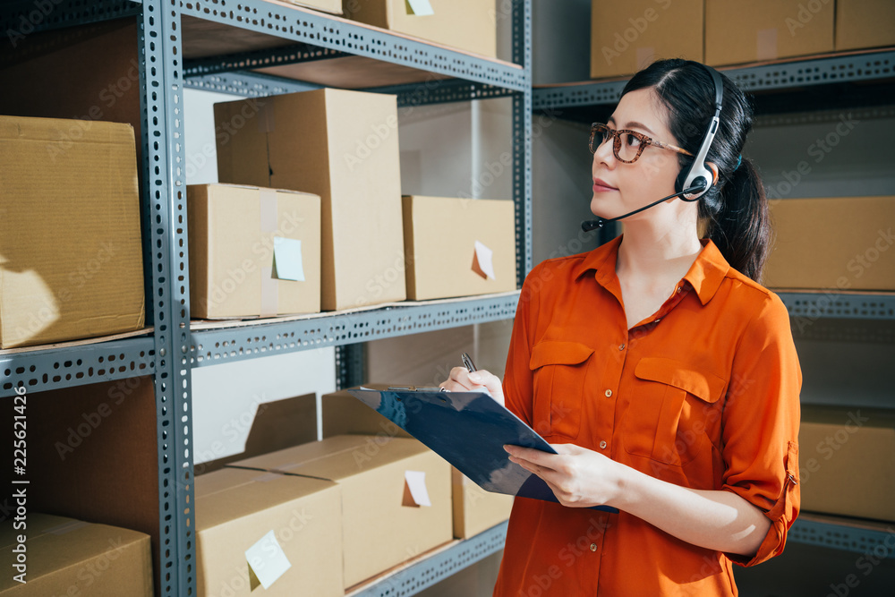 a female professional operator counting parcels