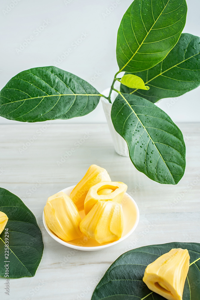 Fresh jackfruit flesh and jackfruit leaves