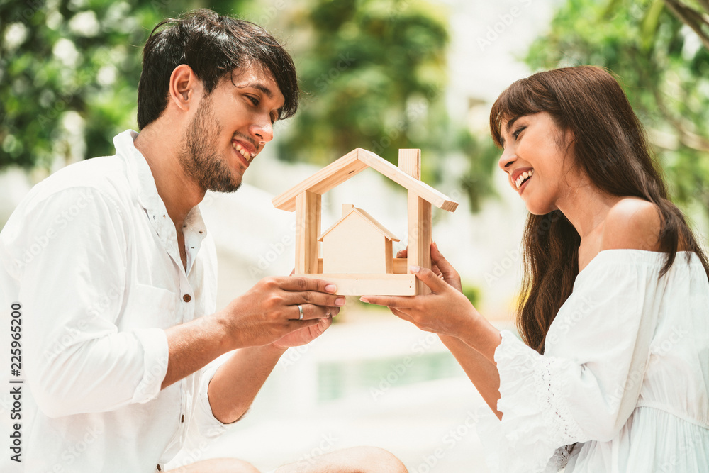 Young couple planning to buy a house concept.