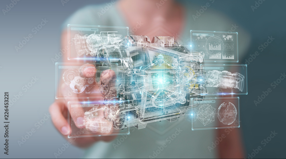 Businesswoman using wireframe holographic 3D digital projection of an engine