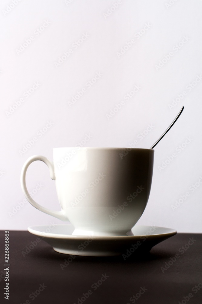 Cup of Drink with Spoon on the Table