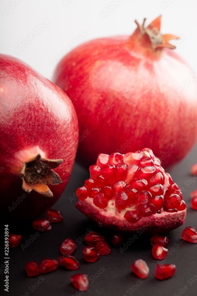 Ripe Pomegranates on Table Close-Up