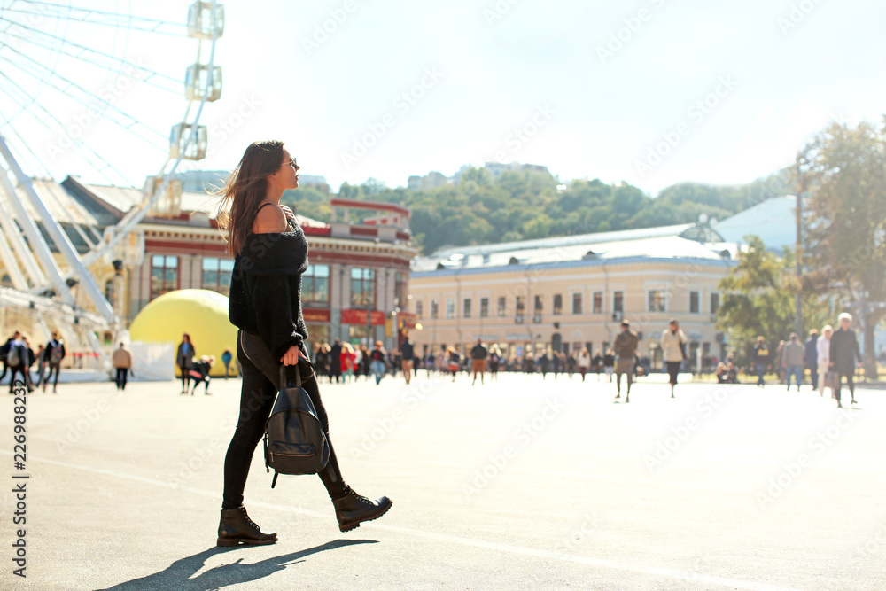 Fashionable young woman outdoors