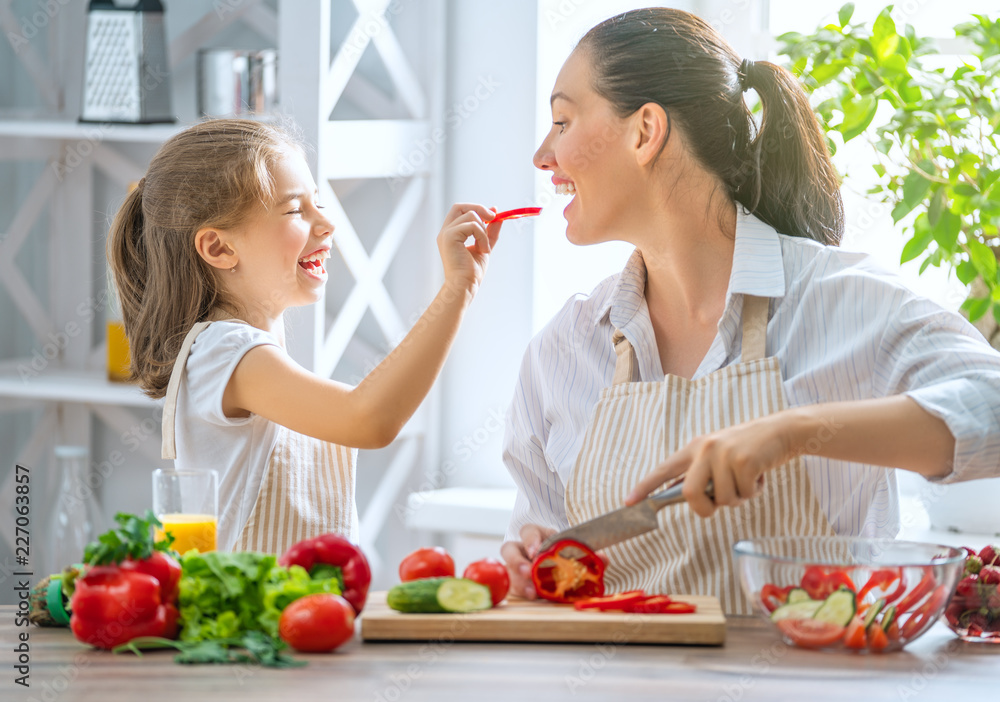 Happy family in the kitchen.