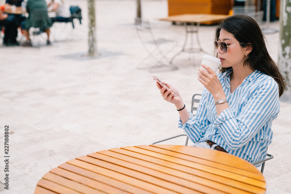 an elegant lady relaxing drinking coffee