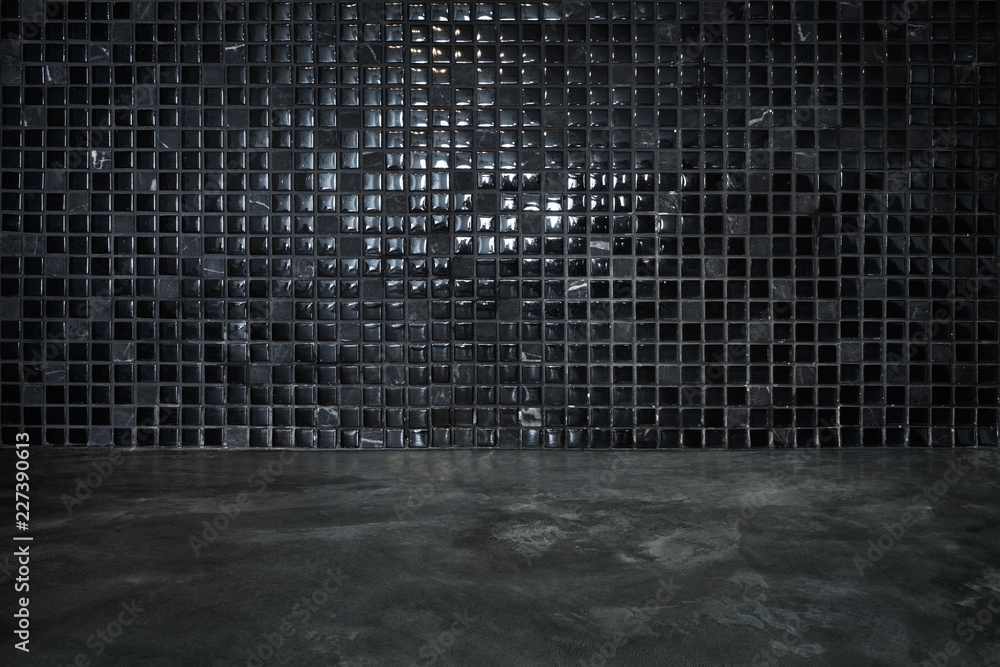 Cement floor with black stone and shiny mosaic wall background