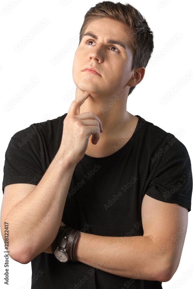 Portrait of Young Thinking Man with Hand on Chin, Isolated