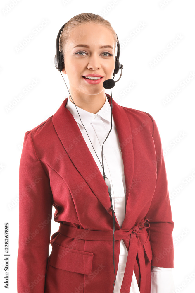 Beautiful female secretary talking through headset on white background