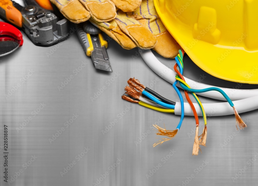 Yellow hard hat and leather work gloves