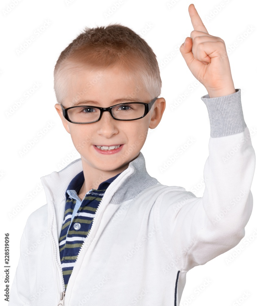 Smart young boy raising finger