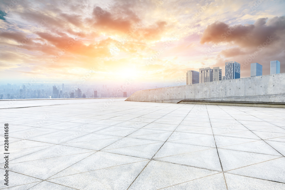 Panoramic skyline and buildings with empty concrete square floor