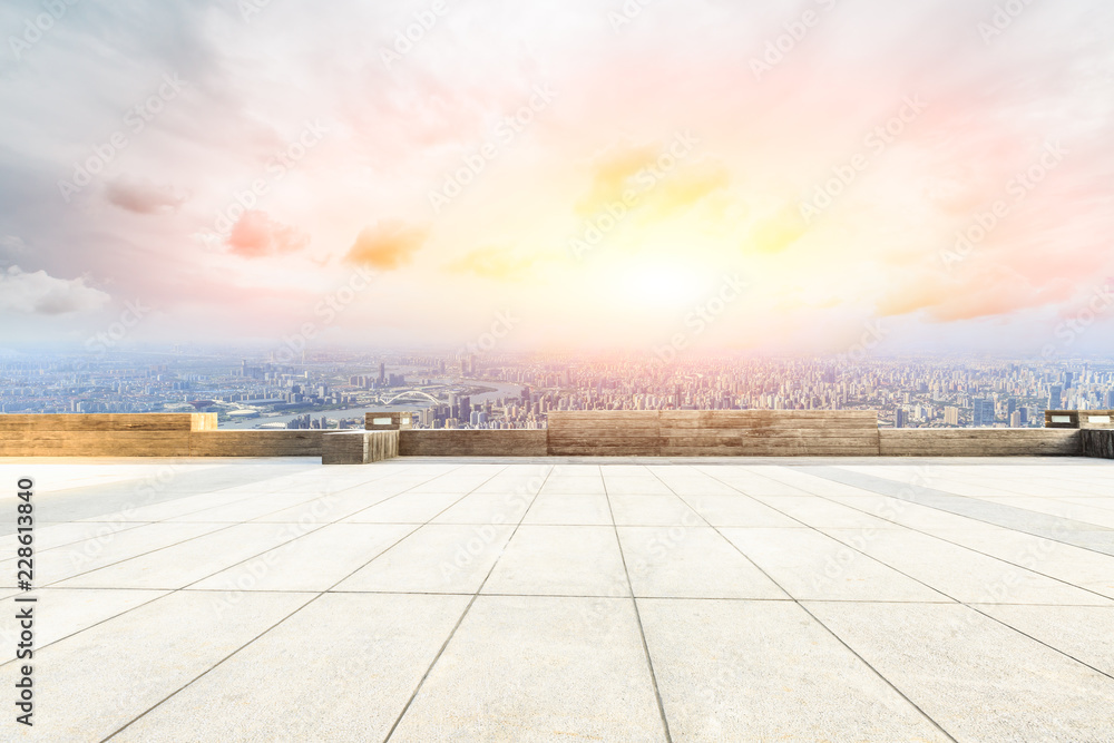 Panoramic skyline and buildings with empty concrete square floor