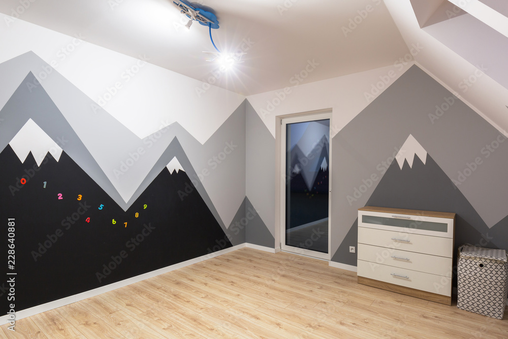 Kids bedroom with mountains chalkboard paint and new laminated floor